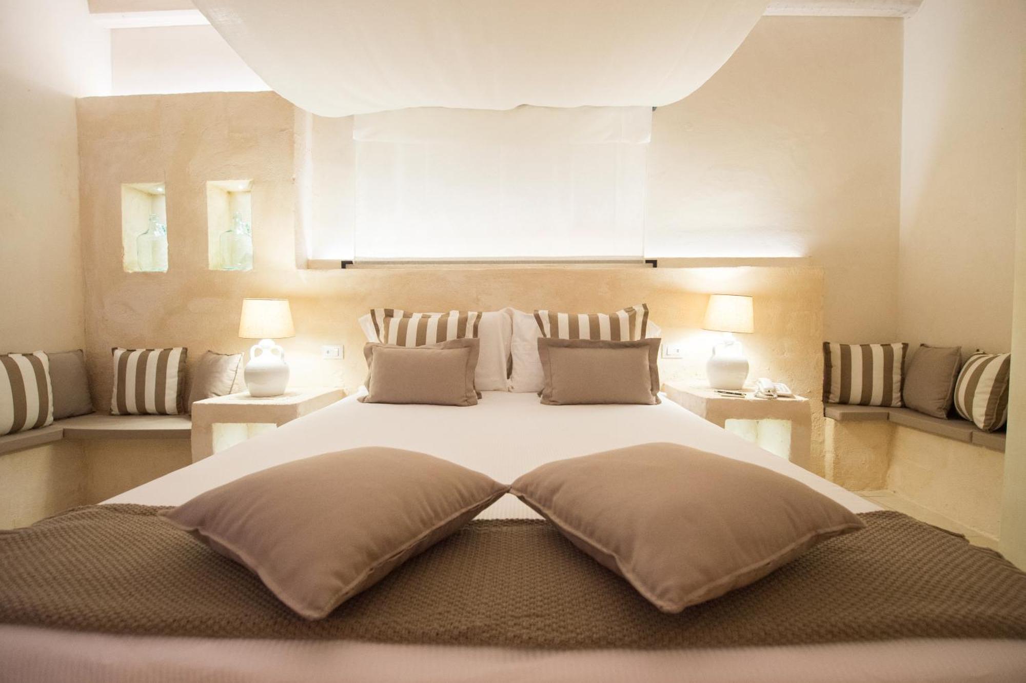 Masseria Messapia Wine Resort & Spa Salento Мезаньє Номер фото