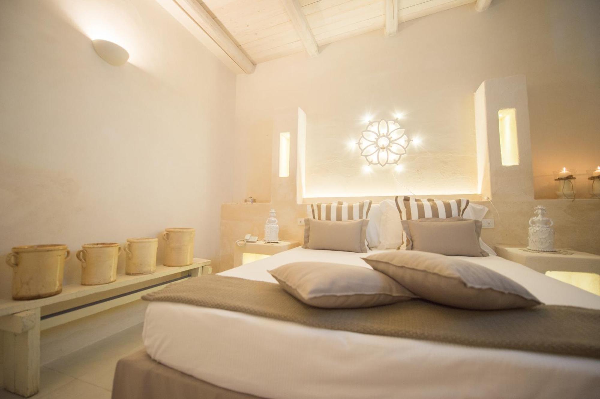 Masseria Messapia Wine Resort & Spa Salento Мезаньє Номер фото