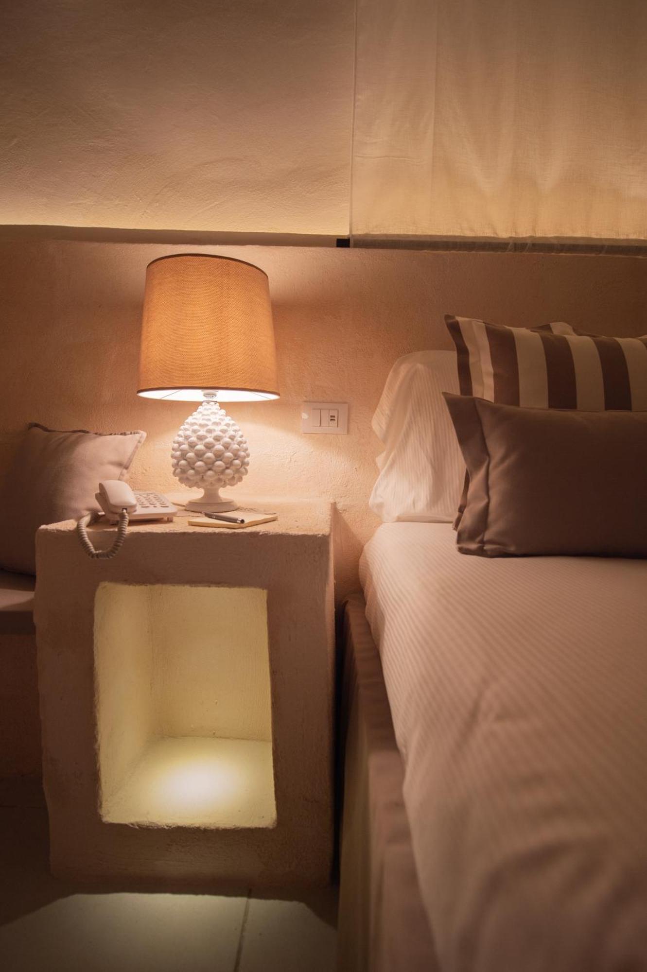 Masseria Messapia Wine Resort & Spa Salento Мезаньє Номер фото