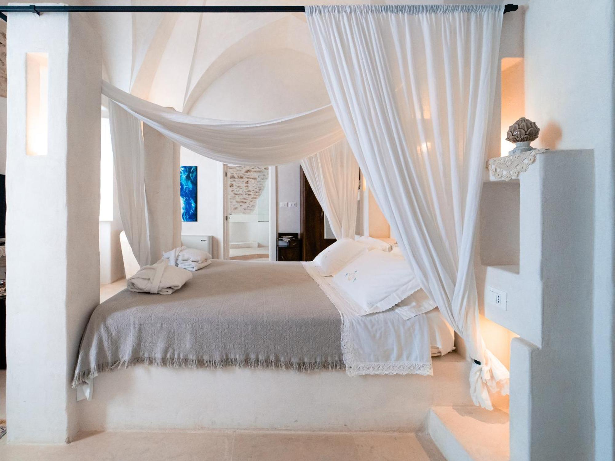 Masseria Messapia Wine Resort & Spa Salento Мезаньє Номер фото