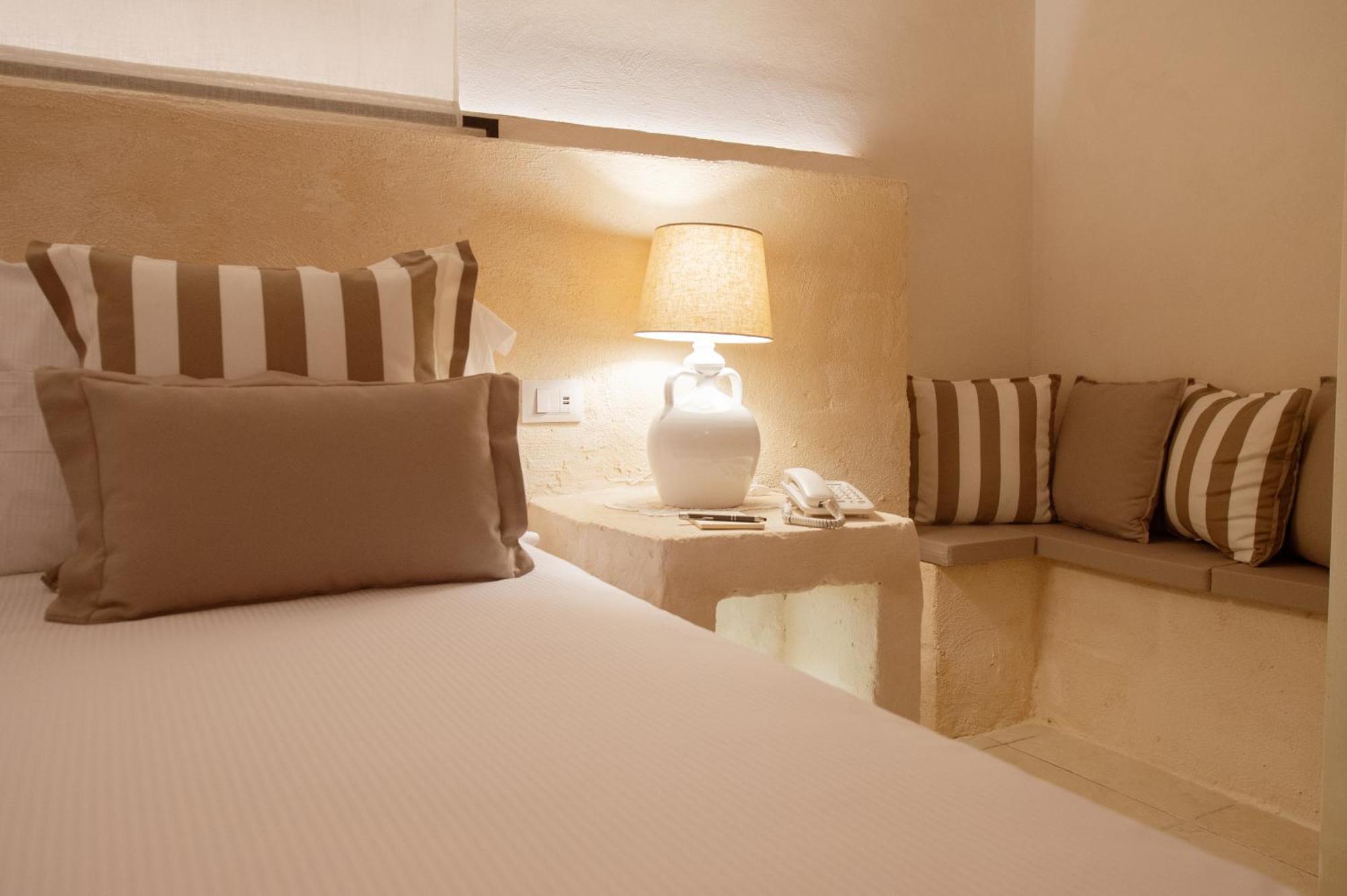 Masseria Messapia Wine Resort & Spa Salento Мезаньє Номер фото