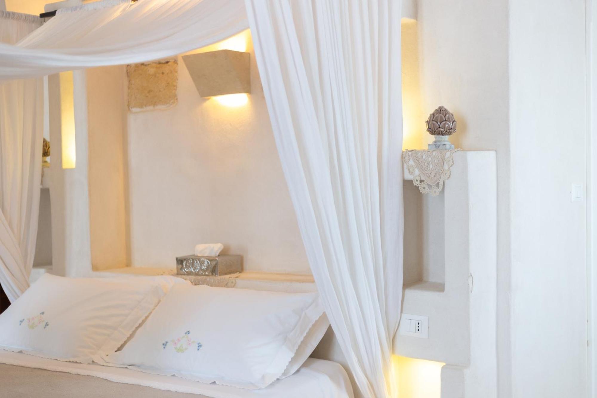 Masseria Messapia Wine Resort & Spa Salento Мезаньє Номер фото