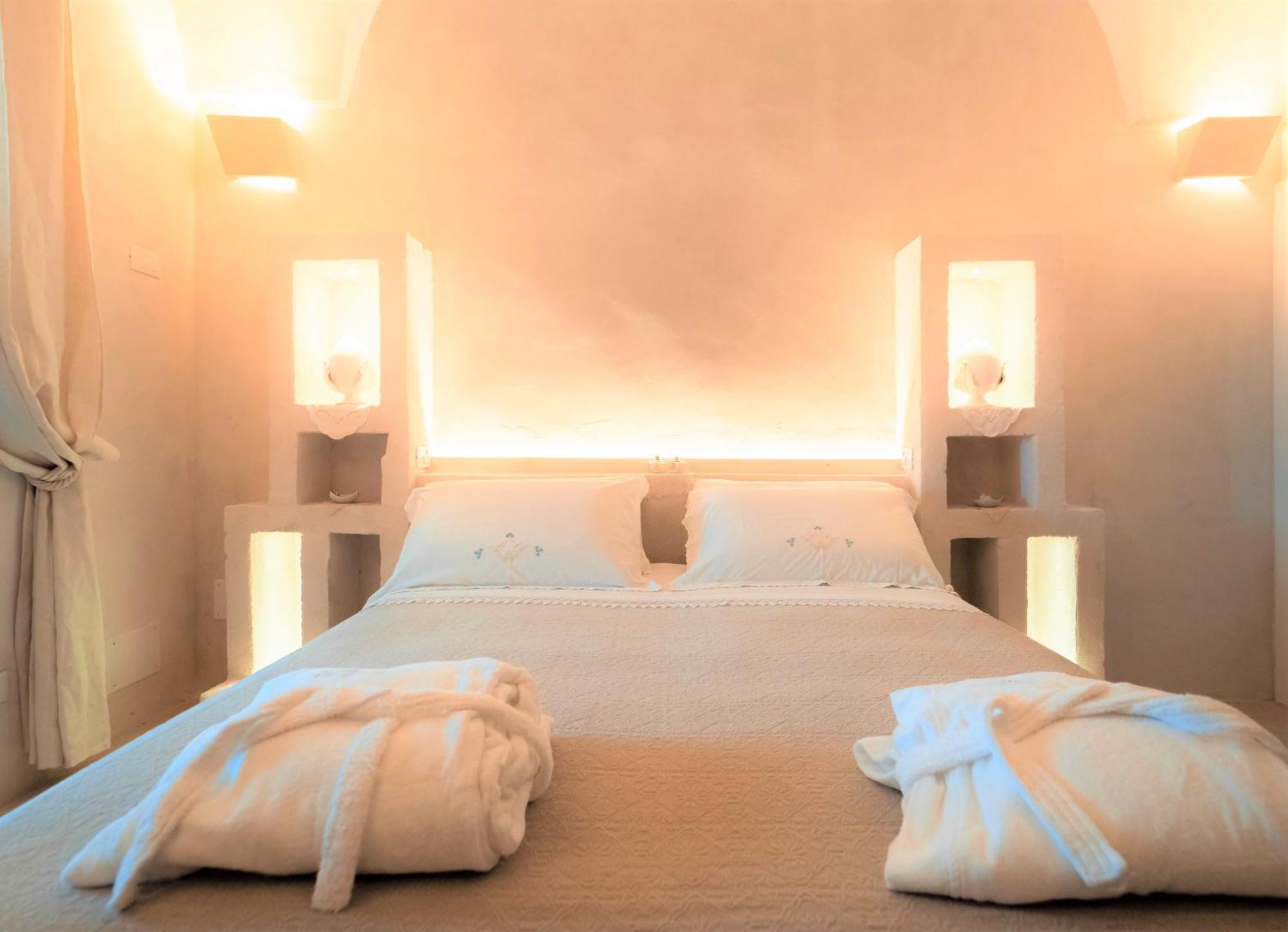 Masseria Messapia Wine Resort & Spa Salento Мезаньє Номер фото