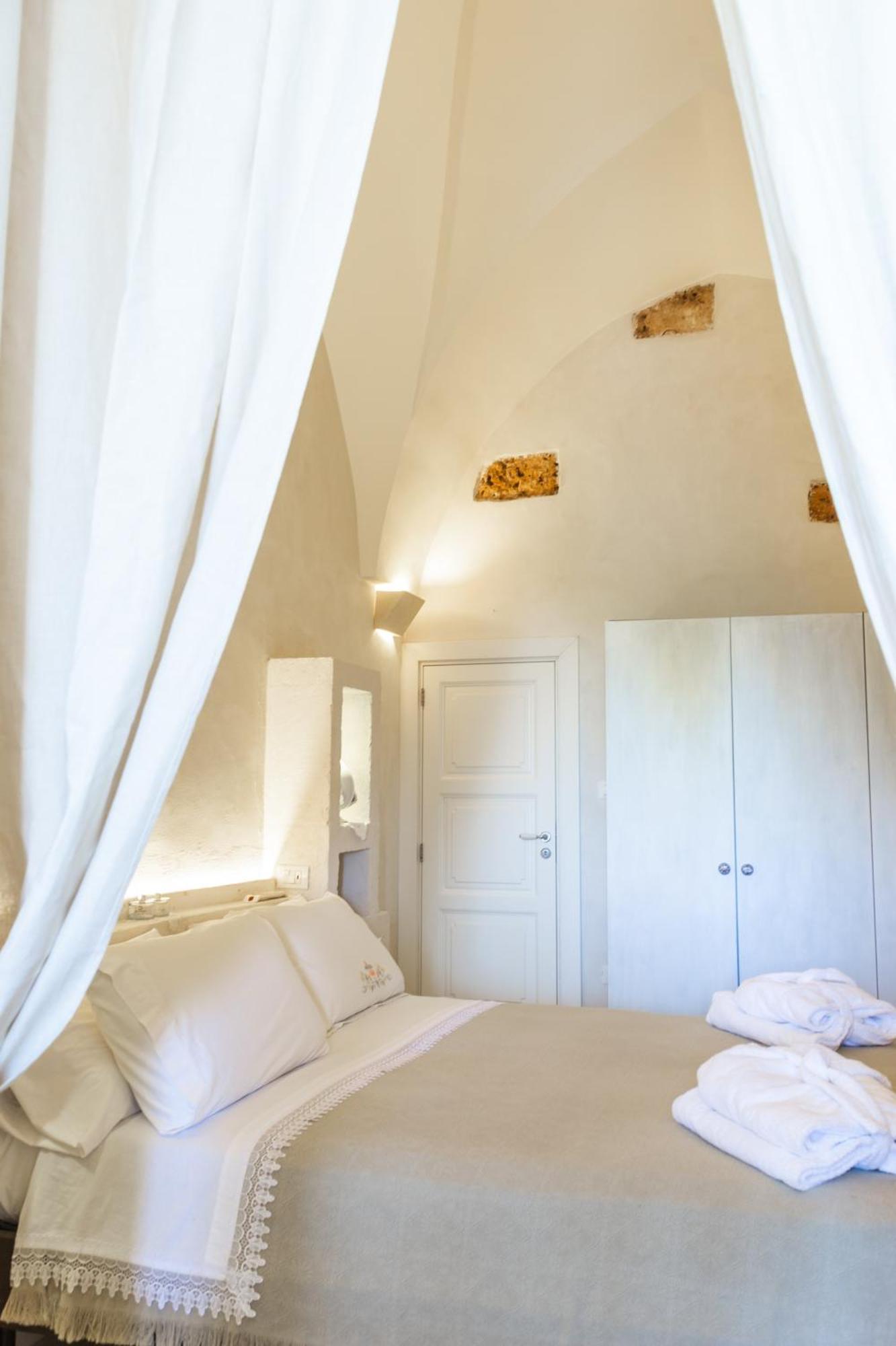 Masseria Messapia Wine Resort & Spa Salento Мезаньє Номер фото